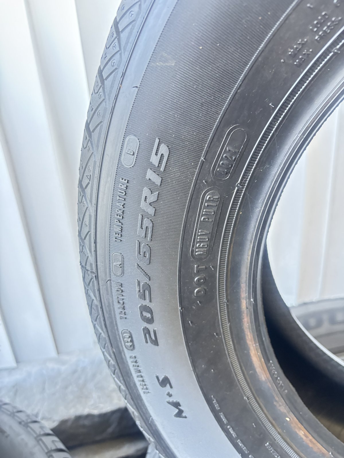 Tire sidewall showing 205/55R15 size